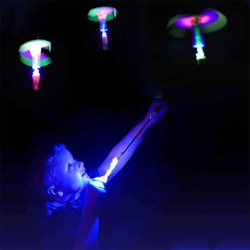 10Pcs LED Arrow Helicopter Slingshot Flying Outdoor Flashing Kids Toys