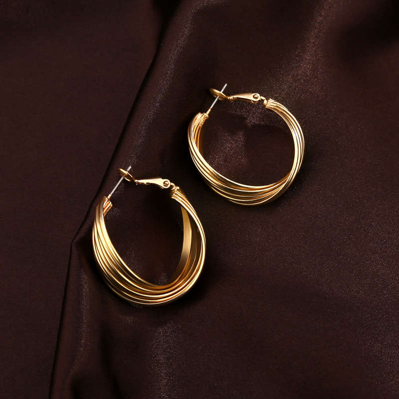 Pair of Womens Fashion Gold Twist Hoop Earrings